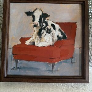 Framed Cow Painting on Red Chair